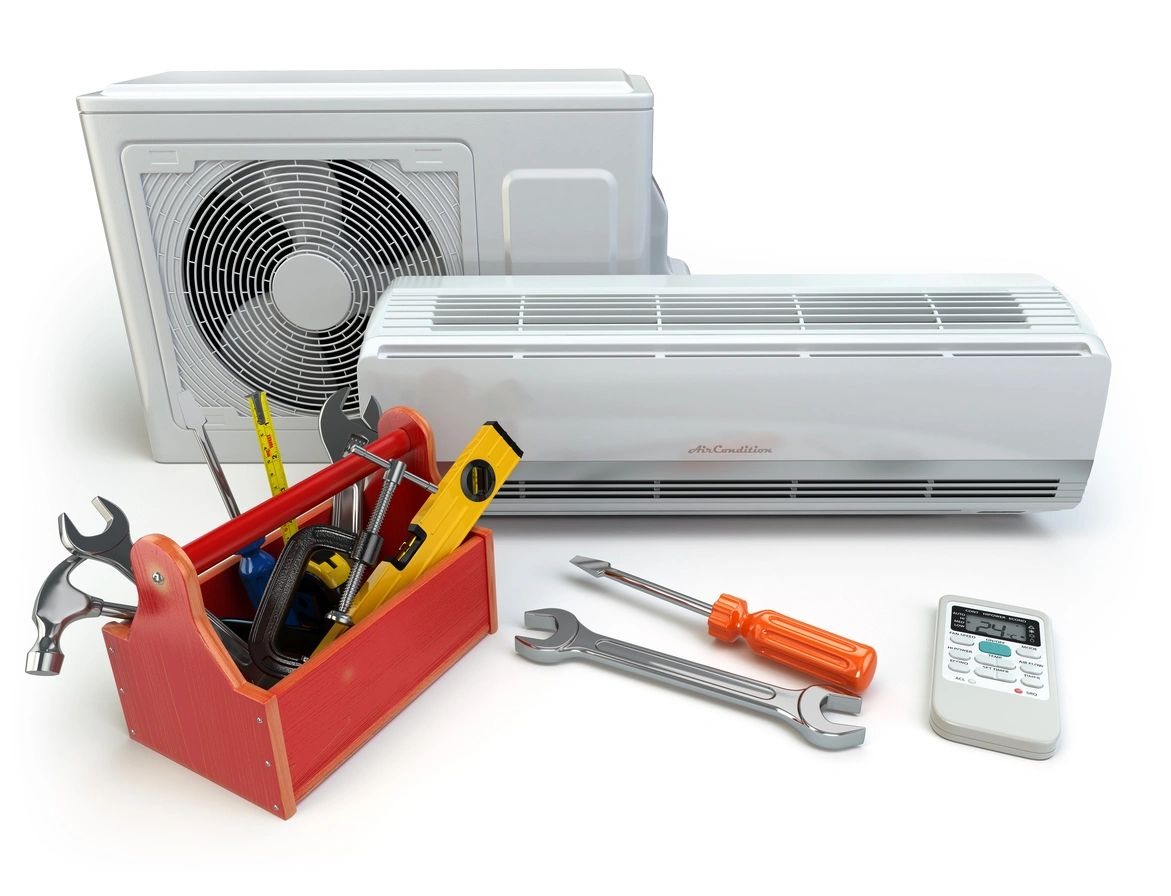 A red toolbox with tools and air conditioner on it.