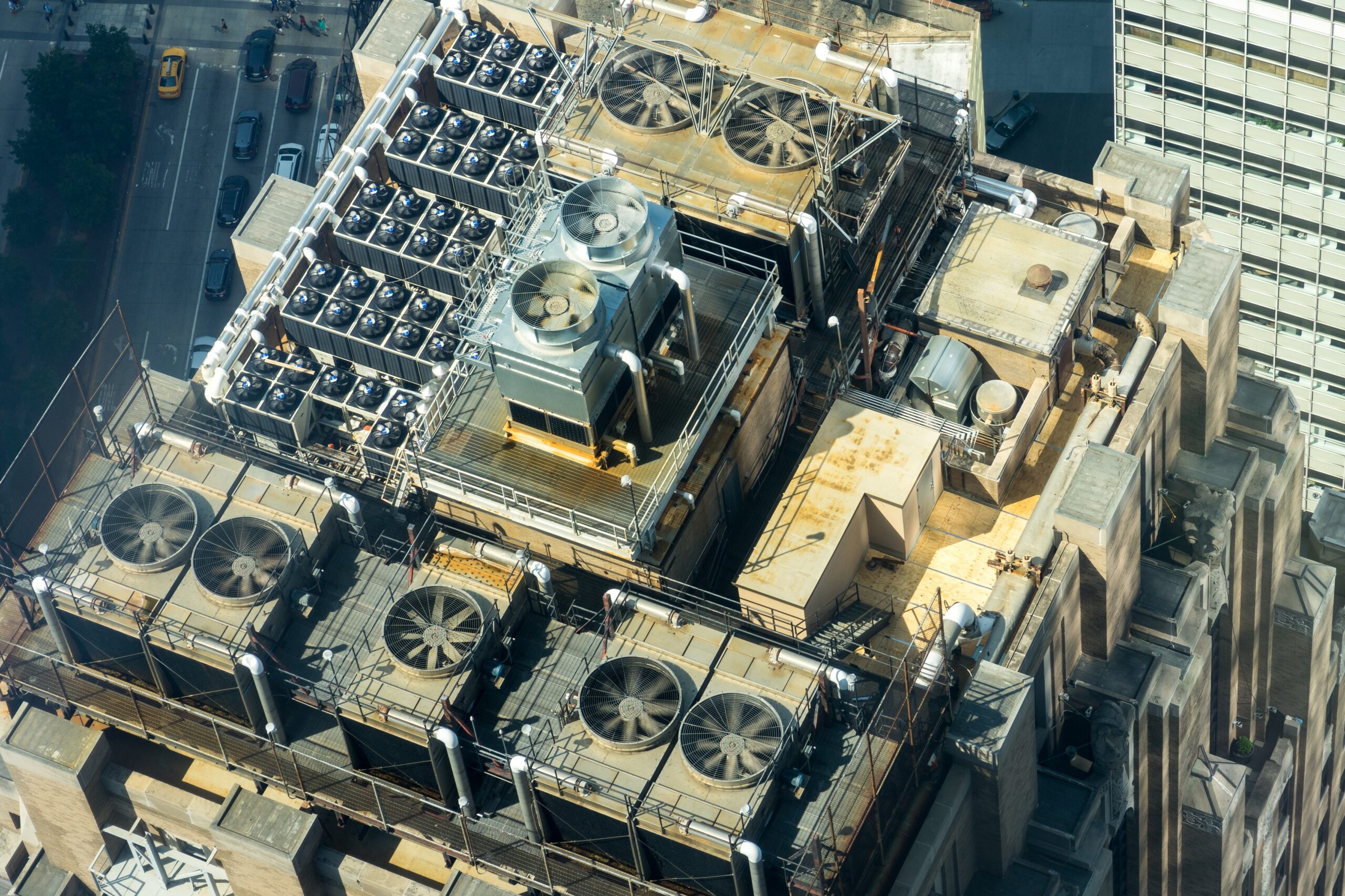 A building with many fans on the roof.